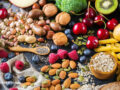 Nuts, berries, grain, vegetables, and fruits spread out
